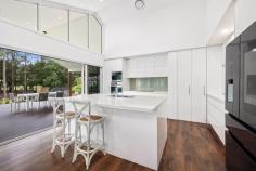 5 Firetail Court Tanawha QLD 4556 Nestled in one of Tanawha's most coveted neighbourhoods, 5 Firetail Court is a one-of-a-kind residence that combines a single level contemporary design with one of the flattest, quietest and most usable blocks in the area. This beautiful property caters perfectly to the needs of families, offering a seamless indoor-outdoor lifestyle in a tranquil setting with plenty of room for activities and expansion. Set on a beautifully landscaped block, the property features a level of ambience and tranquillity, away from all the noise which is highly desired but difficult to come by in the area. The fenced backyard ensures privacy for kids and pets alike while offering ample flat space for an extension to the home, tennis court, basketball court or shed. Perfectly designed for family living, this home provides ample space for entertainment and/or relaxation. Enjoy movie nights by the indoor double sided fireplace in the cosy living areas, host gatherings by the pool, or unwind in the generous living spaces. The expansive open-plan living and dining area flows seamlessly into the modern kitchen, equipped with high-end appliances, a generous island bench, and plenty of storage. The high raked ceilings, ducted air conditioning and ceiling fans throughout provide breezes year-round. The indoor flows beautifully with the outdoor entertaining, offering a stunning wrap-around deck that overlooks the pool and picturesque backyard. The luxurious master suite is a true retreat, boasting French doors that open onto the deck, a spacious walk-in robe, and a beautifully renovated ensuite featuring his and hers sinks and a large bath. Additional bedrooms are thoughtfully designed, each with built-in robes, ceiling fans and ample natural light. The convenience of nearby private schools, universities, shopping and dining precincts, ensures that you have everything you need just moments away, all while enjoying the peace and privacy of 4556 acreage living. The features of 5 Firetail Court include: Luxurious modern home on a spacious 4,277 m² block in serene Tanawha Inviting pool with a large outdoor entertaining area Ample flat space perfect for extensions to the home Open-plan living and dining featuring a cosy fireplace Modern kitchen with induction cooktop, ample storage, and entertainer's island Stunning raked ceilings with double-height windows in the kitchen area Luxurious master suite with deck access and stunning ensuite Three additional bedrooms with built-in robes Dedicated office space Electric gate and double lock-up garage for security and convenience Ample storage throughout the home Ducted air conditioning and ceiling fans in every room Close to prestigious schools, universities, and just minutes from beaches, shopping, and Maroochydore CBD This property offers a rare combination of space and serenity, all whilst enjoying the freedom of generous outdoor living, beautifully surrounded by nature.