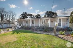 1 Birch Street Smeaton VIC 3364 $585,000 - $620,000 Welcome to 1 Birch Street, Smeaton, a beautifully renovated weatherboard home set in a quiet location with a stunning country outlook. This property sits on a huge block, perfect for those seeking a spacious and peaceful lifestyle. The home features three bedrooms, one large, tiled bathroom, and three living areas, offering ample space for family living. • The kitchen is a standout, boasting a stainless steel oven, dishwasher, and laminate benchtops, including a generous island bench. • Charming barn doors in the kitchen bedroom and lounge areas add a touch of rustic charm. • Living spaces are enhanced by floating vinyl floorboards and double-glazed windows, ensuring comfort and energy efficiency throughout. • Two cosy woodfires and three split systems for heating and cooling, providing year-round comfort throughout the house. Outside, the property offers an enclosed entertaining area at the back, perfect for hosting gatherings, along with great decking that surrounds the home. The exterior includes a double garage, additional shedding, a carport, and rear access for convenience. A large chook run and water tank add to the property's appeal, making it ideal for a hobby farm lifestyle. The low maintenance garden is beautifully landscaped, ensuring easy upkeep. 1 Birch Street is not only a family-friendly home but also features solar panels, a new roof, and plenty of cupboard space throughout, making it both practical and sustainable. With a serene setting and plenty of modern amenities, this property is a perfect blend of comfort, style, and functionality.
