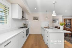 12 Barton Cl Mittagong NSW 2575 $1,395,000 Welcome to 12 Barton Close, a modern retreat at the end of a tranquil cul-de-sac. Surrounded by a beautifully landscaped front garden featuring low-maintenance plantings, the property boasts a bright, north-facing aspect that invites warm sunlight throughout the day. Inside, the home is designed for family living, with an open-plan kitchen, living, and dining area complemented by a separate media room—perfect for movie nights or quiet relaxation. The covered, private alfresco area extends your living space outdoors, making it ideal for year-round entertaining. The bonus "Artist Retreat" at the rear provides an inspiring creative haven for painting, writing, or simply finding your muse. With easy access to Mittagong Town Centre and the Sydney freeway, you can enjoy the peace of your cul-de-sac retreat while remaining close to all essential amenities. Move in, relax, and immerse yourself in the idyllic surroundings of your new home. Features include; Gas ducted central heating | Plantation shutters Laminate flooring | Woollen carpet Kitchen featuring pendant lighting, BLANCO 900mm oven, 900mm gas cooktop, Miele dishwasher and large butler’s pantry Master bedroom with walk-in robe and ensuite Large covered alfresco area NBN fibre to the house 5270L water tank