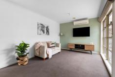 2/5 Rosslyn Avenue Seaford VIC 3198 $650,000 - $690,000 Discover the perfect blend of modern elegance and low-maintenance living in this superbly designed three bedroom home, ideally situated to enjoy leisurely bike rides and scenic walks along Kananook Creek reserve, with Seaford beach just beyond. Nestled at the rear with only two on the block, this home boasts a delightfully spacious single-level floor plan. The formal living room is complemented by a split system heating and cooling, ensuring year-round comfort. The well-appointed kitchen features stainless-steel appliances including gas cooking and breakfast bar that overlooks the adjoining dining. Here, glass sliding doors open out to an undercover private decking area, perfect for indoor/outdoor entertaining. The master bedroom offers the convenience of a walk-in robe and private ensuite, while the two additional bedrooms feature built-in robes and share a central family bathroom with a separate bath and shower. A separate laundry provides internal access to the remote double lock-up garage, adding to the home's practicality. Offering a lifestyle of unmatched convenience and exuding contemporary elegance with a focus on style and quality, this home makes an ideal choice for those seeking an easy-care lifestyle in a highly desirable Seaford location.