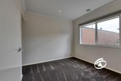 229 Pink Hill Blvd Officer VIC 3809 $640,000 - $700,000 Discover the ideal lifestyle prize for young professionals or families seeking a low-maintenance home in a prime location. Just a short stroll from schools, parkland, and shopping facilities, this townhouse offers both convenience and comfort. Striking Street Appeal with its modern facade, this townhouse welcomes you into a safe and light-filled living space. The layout features three spacious bedrooms, including a master suite with a walk-in robe and a full ensuite bathroom. The two additional bedrooms come equipped with built-in robes and are serviced by a family-friendly bathroom. Central to the home is a bright open-plan family and meals area, complete with sliding doors that lead to a private terrace. This space is perfect for entertaining and everyday living, featuring ducted heating, evaporative cooling as well as split system cooling for year-round comfort. The functional kitchen, dressed in brilliant white, boasts stone benchtops and quality appliances, seamlessly integrated into the living space. Step outside to your versatile terrace, the perfect spot to soak up the sun or unwind after a busy day.