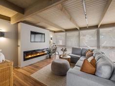 19 Beach Pde Sandy Point VIC 3959 $915,000 This meticulously presented property offers the perfect low-maintenance coastal escape. Situated on an approx. 583m² block, just 200 meters from Ned Neale's lookout and the dog-friendly beach, and 800 meters from the local coffee shop and Surf Club. Enjoy the very best of beachside living with convenience right at your doorstep. The striking architectural design showcases a blend of 'Sharpline' Colorbond and Victorian Ash shiplap cladding, beautifully complimented by low-maintenance coastal gardens. The outdoor space has been thoughtfully crafted for year-round enjoyment, including a fully enclosed Merbau deck, firepit, and a private, secure rear garden-perfect for entertaining or simply relaxing in every season. Step inside to a bright, airy interior defined by a neutral colour palette, extensive glazing, and a northern orientation that bathes the home in natural light. The open-plan living area seamlessly flows onto the outdoor entertaining space, while the kitchen boasts premium finishes such as Caesarstone countertops, Bosch appliances and earth-toned soft close cabinetry, perfectly paired with timber flooring and open shelving. Zoned reverse cycle air conditioning and electric fireplace ensure the perfect temperature inside. The master bedroom adjoins a luxuriously appointed bathroom that features a large walk-in shower, Blackbutt vanity, underfloor heating, and heated towel rail. A central skylight fills the space with natural light, creating a spa-like atmosphere. The home also includes a well-appointed laundry/utility room with built-in storage and a separate W.C. The lined and insulated garage includes a storage area that doubles as a games room or home gym, with parking space for multiple vehicles or a boat. Designed with sustainability in mind, the property features a 10kW solar system, 14kW battery storage (full house backup), solar hot water, and 3-phase power ready for future EV quick charging. Bore and tank water with a filtration system for peace of mind and water security, and a heated outdoor shower for rinsing off after the beach. Whether you're looking for a permanent coastal residence or the ultimate beachside retreat, this immaculate home offers the ideal combination of modern living, convenience, and easy maintenance.