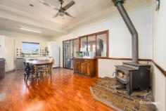 2 Rockvale Road Armidale NSW 2350 $440,000 - $480,000 Nestled in the heart of North Hill, this character-filled weatherboard home at 2 Rockvale Road offers a perfect blend of traditional charm and modern comfort. Ideally located near corner stores and local schools, this property is perfect for families or professionals seeking a cozy yet convenient lifestyle. Step inside to discover the beautifully detailed dark timber feature walls in the living room, with reverse-cycle air conditioning, gas points and rich timber flooring, this space is designed for year-round comfort. The open-plan kitchen and dining area is an entertainer’s delight, complete with a second fireplace that creates a cozy atmosphere for gatherings. The home features two well-sized bedrooms, both with built-in wardrobes, plus an additional study or home office area for extra versatility. The main bathroom includes a shower and bath, with a separate toilet for added convenience. Outside, the easy-to-maintain backyard is a haven for relaxation and outdoor living. Enjoy the undercover entertaining deck, perfect for barbecues or quiet evenings, and make use of the raised garden beds – ideal for growing your own vegetables. A single lock-up garage and carport, complete with an additional toilet, provides practical storage space, while the garden shed ensures everything has its place. This North Hill gem is an opportunity not to be missed – a character home offering comfort, convenience, and a charming lifestyle.
