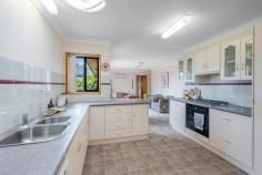 49 Brightlands Avenue Blackheath NSW 2785 $900,000 - $990,000 Set on an easily accessible predominantly level block, this original brick family home offers dual living areas and ample storage throughout. With four light-filled well proportioned bedrooms and a privately enclosed rear garden, this an ideal opportunity for those looking for a peaceful setting. It sits within a 1.8 km 3 minute drive to the local primary school and just a further minute to all the amenities of Blackheath village. In a tightly-held area only metres from the golf course, this home offers the opportunity to secure a neatly presented original that allows further scope for contemporary revisions when ready. Features Breakdown: Double garage to fore with workshop space; additional off-street parking Dual living areas offering versatile use for family members Sliding doors from kitchen/dining area out to north facing deck area Spacious master with shower ensuite; 3 further bedrooms all with BIWs Open plan kitchen with gas cooktop; separately zoned dining area Ducted gas central heating; Int. laundry with access to rear garden Level lawned garden to rear, fully fenced perfect for pets & children 836 sqm level block, peaceful position close to golf course; 1.9km to village