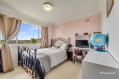 12 Wilson Avenue Armidale NSW 2350 $495,000 12 Wilson Avenue is a charming 3-bedroom home in the sought-after North Hill area, ideal for a growing family. Located on a quiet street, it’s just a short walk to schools, parks, and shops. Freshly painted, the home boasts a welcoming façade with a privacy hedge, well-maintained gardens, and two parking spaces. Inside, the main living area is filled with natural light from large north-facing windows and features polished wooden floors and a warm feature wall. The spacious kitchen offers plenty of bench space, a dishwasher, and stunning views of Armidale’s southeast hills. An additional rumpus room provides built-in storage, a desk, and internal access to the carport. The three bedrooms are generously sized, two with north-facing windows for maximum sunlight, and five freestanding wardrobes are included. The bathroom offers a luxurious large tub – big enough to stretch out and soak, or for multiple little ones to splash happily, heated towel rails, underfloor heating, and plenty of storage, with a separate toilet for added privacy. Outside, the fully fenced backyard features garden beds, a patio, a sandpit, a large dog kennel, and access to a well-equipped shed and under-house storage. The property also benefits from a reverse-cycle air conditioner and 20 solar panels feeding into its own battery, making it energy-efficient and comfortable year-round.