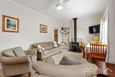 13 Ryan Street Talbingo NSW 2720 Positioned on the high side of the treelined street of Ryan, sits this well maintained high-set three-bedroom home. Boasting three great sized bedrooms, formal living, well maintained kitchen, ample heating and cooling options and a 6m x 10m colourbond shed with awning for additional covered parking or the perfect rear entertainment area. You will love the livability of this extremely well maintained three-bedroom home, in the heart of Talbingo. Do not miss your opportunity, call today to book your inspection! Premiere Features: - Three great sized bedrooms, with two offering ceiling fans and split system air conditioning - Centrally located and well-maintained bathroom with shower, single vanity and toilet - Kitchen with electric cooktop, ample storage options and bench space - Large formal living room upon entry with wood box fire, split system air conditioning and ceiling fan - Internal laundry with new flooring positioned to the rear of the plan - Mudroom with external access adjacent the laundry - Second separate toilet - Quaint covered timber entry - Gas hot water - Fully fenced and low maintenance yard - 6m x 10m colourbond shedding with additional awning running the length of the shed, perfect for additional covered parking or fully covered outdoor entertaining area - Garden shed - Additional wood shed - External power to the front of the home - Approximate 710m² allotment Do not miss your opportunity to secure this low maintenance and well maintained three-bedroom family home with all the modern creature comforts.