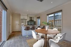 229 Pink Hill Blvd Officer VIC 3809 $640,000 - $700,000 Discover the ideal lifestyle prize for young professionals or families seeking a low-maintenance home in a prime location. Just a short stroll from schools, parkland, and shopping facilities, this townhouse offers both convenience and comfort. Striking Street Appeal with its modern facade, this townhouse welcomes you into a safe and light-filled living space. The layout features three spacious bedrooms, including a master suite with a walk-in robe and a full ensuite bathroom. The two additional bedrooms come equipped with built-in robes and are serviced by a family-friendly bathroom. Central to the home is a bright open-plan family and meals area, complete with sliding doors that lead to a private terrace. This space is perfect for entertaining and everyday living, featuring ducted heating, evaporative cooling as well as split system cooling for year-round comfort. The functional kitchen, dressed in brilliant white, boasts stone benchtops and quality appliances, seamlessly integrated into the living space. Step outside to your versatile terrace, the perfect spot to soak up the sun or unwind after a busy day.