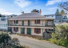 12 Fitzroy Street Kiama NSW 2533 $2,350,000 For those with an appreciation for history, the "Figtree Inn" offers a rare opportunity to own a piece of Kiama's vibrant past. Nestled in the tightly-held Pheasant Point precinct, this rare jewel stands as a living testament to Kiama's rich heritage. Built circa 1860, the "Figtree Inn" stands proudly as one of Kiama's oldest residences. Initially part of the Gard farm complex, it later became the site of the original Figtree Inn. 12 Fitzroy Street holds further historical significance as they were converted into homes for foremen during Kiama's bluestone quarrying period from 1876 to 1890. From its elevated position, this historic gem provides sweeping views of Kiama Harbour, the township, and the surrounding escarpment. Imagine yourself on the wrap-around balcony, taking in the stunning harbour vistas while surrounded by the timeless beauty of this Victorian-era home. Awaiting a passionate visionary to restore it to its former glory, this authentic historic dwelling combines charm and versatility. It features two spacious living areas, four bedrooms, an open study nook, a formal dining room as well as a cozy eat-in kitchen with a wood-burning fireplace. The detached two-car garage, complete with a tool shed and bathroom facilities, adds practicality to this remarkable space. Located just a short stroll from Kiama's vibrant cafes, restaurants, pristine beaches, and the historic township, "Figtree Inn" offers the perfect blend of history and modern convenience. Whether you're a heritage enthusiast or simply someone looking for a unique home with a story to tell, this property offers a once-in-a-lifetime opportunity to own a piece of Kiama's past. For a glimpse of Kiama's "yesteryear", we encourage your immediate inspection.