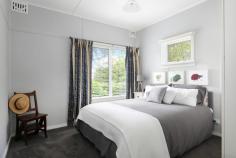 31 Northcote Road Leura NSW 2780 $970,000 - $1,050,000 Situated within a peaceful pocket of South Leura close to the golf course and Everglades Gardens, "Wren's Nest" is an attractively unique mountain cottage, and without a doubt, offers the simple pleasures of mountain life. Immaculately presented, this two bedroom home has been lovingly curated throughout. From its glass ceiling garden conservatory room to its clever retreat space secreted away in the tiered gardens, this home truly offers a mountain escape from a busy city life. When coming to the mountains in winter, the beauty of collecting kindling and starting a warming fire is undeniable. However practicality also presides with reverse cycle air conditioning units. Filled with natural light and offering every modern day convenience, this home offers turn-key comfort in its entirety. We encourage you to definitely add this one to your priority viewing list. Breakdown of Features: Open plan dining, new kitchen and living zone connects with 'garden' conservatory Open fireplace and reverse cycle air conditioning wall units Two bedrooms offering built in storage and elevated district view perspectives Immaculate subway-tiled main bathroom through to additional linen storage New spacious laundry combined with second shower bathroom from covered deck Multiple garden seating areas throughout cleverly designed tiered gardens Covered entry verandah and rear deck offering additional relaxation zones Garden retreat room offering extra versatile usage and storage; off-street parking Walking distance to Everglades Gardens cafe; 3 min drive 1.8kms to Leura Mall