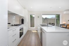 2 / 506 Bell Street Redan VIC 3350 $495,000 - $535,000 Discover effortless style and comfort in this impeccably designed townhouse by Miles & Co. Featuring double-glazed windows, central gas heating, and split systems in both the living area and main bedroom, this home offers ideal climate control year-round. The open-plan living and dining area is bathed in natural light, flowing seamlessly to a private deck with an automatic awning-perfect for outdoor relaxation. A low-maintenance garden with a built-in watering system ensures easy care. The sleek kitchen is a chef's delight, featuring stone benchtops and high-quality Bosch appliances. With three spacious bedrooms, including a main suite with an ensuite and walk-in robe, plus a double garage with internal access, this home combines style, convenience, and security. Situated in the sought-after suburb of Redan, it's just moments from shops, schools, and Ballarat's CBD. This townhouse is the perfect blend of modern living and low-maintenance ease.