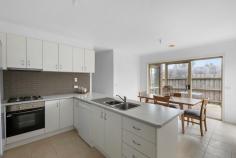 2/5 Rosslyn Avenue Seaford VIC 3198 $650,000 - $690,000 Discover the perfect blend of modern elegance and low-maintenance living in this superbly designed three bedroom home, ideally situated to enjoy leisurely bike rides and scenic walks along Kananook Creek reserve, with Seaford beach just beyond. Nestled at the rear with only two on the block, this home boasts a delightfully spacious single-level floor plan. The formal living room is complemented by a split system heating and cooling, ensuring year-round comfort. The well-appointed kitchen features stainless-steel appliances including gas cooking and breakfast bar that overlooks the adjoining dining. Here, glass sliding doors open out to an undercover private decking area, perfect for indoor/outdoor entertaining. The master bedroom offers the convenience of a walk-in robe and private ensuite, while the two additional bedrooms feature built-in robes and share a central family bathroom with a separate bath and shower. A separate laundry provides internal access to the remote double lock-up garage, adding to the home's practicality. Offering a lifestyle of unmatched convenience and exuding contemporary elegance with a focus on style and quality, this home makes an ideal choice for those seeking an easy-care lifestyle in a highly desirable Seaford location.