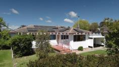12 Wilson Avenue Armidale NSW 2350 $495,000 12 Wilson Avenue is a charming 3-bedroom home in the sought-after North Hill area, ideal for a growing family. Located on a quiet street, it’s just a short walk to schools, parks, and shops. Freshly painted, the home boasts a welcoming façade with a privacy hedge, well-maintained gardens, and two parking spaces. Inside, the main living area is filled with natural light from large north-facing windows and features polished wooden floors and a warm feature wall. The spacious kitchen offers plenty of bench space, a dishwasher, and stunning views of Armidale’s southeast hills. An additional rumpus room provides built-in storage, a desk, and internal access to the carport. The three bedrooms are generously sized, two with north-facing windows for maximum sunlight, and five freestanding wardrobes are included. The bathroom offers a luxurious large tub – big enough to stretch out and soak, or for multiple little ones to splash happily, heated towel rails, underfloor heating, and plenty of storage, with a separate toilet for added privacy. Outside, the fully fenced backyard features garden beds, a patio, a sandpit, a large dog kennel, and access to a well-equipped shed and under-house storage. The property also benefits from a reverse-cycle air conditioner and 20 solar panels feeding into its own battery, making it energy-efficient and comfortable year-round.