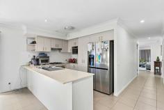 9 Reliance Road Urraween QLD 4655 $599,000 This tidy home is positioned on a low maintenance allotment with great side access in a quiet street and is ideal for those looking to for a tidy, easy-care home, a lock up and leave while they travel or attractive investment property to add to their portfolio. Positioned amongst other quality homes your search for the perfect home or an excellent opportunity for capital growth is superbly positioned within close proximity to schools, local shops, medical precinct, parklands & bikeways. The property comprises of four bedrooms, two bathrooms, open plan living & dining areas, well equipped & modern kitchen, separate laundry & undercover outdoor entertaining area. This home is in great condition with plenty of room to add your own personal touches. Features Include: • Open plan kitchen, living and dining with air-conditioning, flowing onto undercover alfresco area via sliding doors • Modern kitchen with gas cooktop, electric appliances including dishwasher and stone benchtops • Formal media room/ second living space • Master bedroom with ensuite bathroom and triple mirror sliding door built-in wardrobe • Three additional bedrooms, all with built in wardrobes and ceiling fans • Family bathroom with separate toilet • Full internal laundry room • Double attached garage with automatic lift door • Motion-sensor home security system • Undercover, tiled entertainment area • Tidy gardens with low maintenance landscaping • 450m2 fully fenced allotment Located in a quiet location and only a short distance from all major amenities including Eli Waters Shopping Centre, the medical precinct including the private and public hospitals, St James Lutheran College, Bayside Christian College, Zavier Catholic College, Yarrilee State School dog parks, and other major amenities.