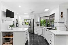11 Bowerbird Avenue Eli Waters QLD 4655 $995,000 - $1,050,000 Situated in a quiet street, this freestanding home is an inviting opportunity for those looking for a tasteful home in an excellent position which is complete with a sparkling inground magnesium pool and shed. Situated in a very central location, this property has a spacious floor plan with effortless indoor to outdoor living, making it the quintessential property for Queensland living. Multiple living areas offer the flexibility and comfort that a family desires in a home. A spacious, modern kitchen overlooks the undercover alfresco area and is the perfect spot for entertaining friends and enjoying the private pool area. This classic home is ideally located in the heart of Eli Waters and is positioned on a spacious 1,068m2 and is completed with a shed with power from which you can directly access reserve and the Hervey Bay Golf Club beyond. If resort style living & convenience are important to you then this home is sure to impress. Features Include: • Tastefully updated home, constructed in approx. 2003 • Front porch entry with Crim safe screen door • Spacious, modern kitchen with 40mm stone benchtops, dishwasher, electric oven and cooktop and soft close cabinets • Dining room adjoining alfresco area • Spacious formal living room with air-conditioning • Secondary forming family room, also with air-conditioning • Generous master bedroom with air-conditioning, plantation shutters, direct external access to pool area, walk in wardrobe and ensuite bathroom with dual basin vanity • Two additional bedrooms, both with built in wardrobes • Optional fourth bedroom or study with built in wardrobe • Family bathroom with stone countertops and separate toilet • Full internal laundry with direct external access • Ceiling fans throughout • Massive double garage with automatic lift door, epoxy floors, direct external access and added width for additional storage • Undercover entertainment area with pull down privacy/shade blinds - flowing directly onto pool area • Sparkling in-ground magnesium pool with cantilever umbrella • 3.48kW solar power system • Colourbond drive through shed with access directly from the adjoining reserve - complete with power - measuring approx. 7.7m long by 3.4m wide with a door height of 2.1m - shed is ideal for the golfer with direct access to the Hervey Bay Golf Course • Carport adjoining shed with shade sail - measuring approx. 3.2m high, 4m wide and 7.7m long • Lawn locker/ garden shed • Side paved courtyard with pull down privacy/ shade blinds • Immaculately maintained and established gardens with irrigation system • Generous 1,068m2 allotment Perfectly suited for those looking to downsize or for those who want to enjoy every day like they are on holiday. All the hard work has been done here and this property is extremely central, being only a short distance to all amenities including schools, hospitals, the local shopping centre and golf course.