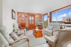 33 Irvine Street Kiama NSW 2533 $1,390,000 - $1,450,000 Discover this charming family home, nestled in one of Kiama's most sought-after spots, offering stunning ocean views from its spacious entertaining deck. Available for sale for the first time, this well-maintained brick-and-tile residence combines classic appeal with modern comfort. Featuring two generous living areas, both formal and informal dining spaces, and a third bedroom currently utilized as an office, this home is designed for effortless family living. Set on a low-maintenance corner block, you'll appreciate the tranquil ambiance and convenient location near town, beaches, and cafes. Expansive North-East entertaining deck with breathtaking ocean views Centrally located kitchen with ample storage Three generously sized bedrooms, including a master with a robe and direct bathroom access First time offered well maintained family home Large under house workspace area and subfloor storage Well-kept established gardens This residence harmoniously blends indoor comfort with outdoor allure. Whether hosting a summer BBQ or enjoying a peaceful winter sunset, this home provides the perfect backdrop for every occasion. Don't let this opportunity slip away.
