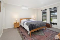 2 / 506 Bell Street Redan VIC 3350 $495,000 - $535,000 Discover effortless style and comfort in this impeccably designed townhouse by Miles & Co. Featuring double-glazed windows, central gas heating, and split systems in both the living area and main bedroom, this home offers ideal climate control year-round. The open-plan living and dining area is bathed in natural light, flowing seamlessly to a private deck with an automatic awning-perfect for outdoor relaxation. A low-maintenance garden with a built-in watering system ensures easy care. The sleek kitchen is a chef's delight, featuring stone benchtops and high-quality Bosch appliances. With three spacious bedrooms, including a main suite with an ensuite and walk-in robe, plus a double garage with internal access, this home combines style, convenience, and security. Situated in the sought-after suburb of Redan, it's just moments from shops, schools, and Ballarat's CBD. This townhouse is the perfect blend of modern living and low-maintenance ease.