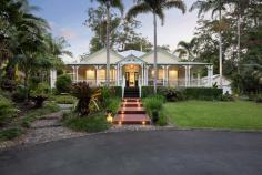 10 Tanawha Road Tanawha QLD 4556 Set in one of the Sunshine Coast's most exclusive small acreage enclaves, 10 Tanawha Road, Tanawha also known as 'Bassignbourn' is a one of a kind residence that seamlessly blends the iconic elements of a Traditional Queenslander extended and updated to meet the demands of today's modern family living with resort features set in a balinese inspired environment. Perfectly in tune with family living, this stunning home offers ample space and practicality for family members of all ages, whether that be a movie in the cinema room, playing basketball on the ½ court, enjoying summer by the pool or unwinding in your own infrared sauna built in to the homes wellness room. Situated on 3,998sqm surrounded by established tropical gardens, tranquil ponds and hand laid pebble pathways, the mix of locality and tranquillity make this home a truly serene oasis in the heart of it all. Positioned amongst Sunshine Coast's leading private schools, Sunshine Coast University, brand new shopping and medical facilities the property offers convenience whilst capturing acreage lifestyle. Entertaining is the centrepiece of this home with Balanise cabana which offers a built in Teppanyaki grill. The home's open plan living and dining space compliment the chef's kitchen which offers 2pac cabinetry, caesarstone benchtop, high end 900mm wide appliances as well as both a butlers and walk-in pantry featuring two dishwashers for added convenience. A widened hallway separates the primary living zone from the lounge room featuring a wood oven and forest views, perfect for cool Winter evenings. The spacious master suite takes you on a trip to the mountains of Indonesia with floor to ceiling sliding doors leading out to a large adjoining private deck, freestanding bath with wrap around windows immersed by the surrounding Balinese inspired private garden including an outdoor shower, truly elevating what is alone a stunning ensuite. A stand alone separate structure accommodates an office space lined with built-in feature walnut cabinetry which cleverly conceals a secret doorway to the adjoining wine room providing an intimate sophisticated setting to showcase your favourite vintages and refrigeration space for ageing wine, cheese and charcuterie. The features of 10 Tanawha Road: Luxurious modern Queenslander, epitome of Tanawha small acreage living Set on a level 3998m² block lined with pebbled pathways & established tropical gardens In ground pool with 'Turbo Twister' waterslide plumbed to filter pump Thatched roof cabana with built in Teppanyaki grill ½ court tennis court with floating 'DreamCourts' Basketball surface Multiple living areas with roaring high ceilings, wide hallways and skylights Caesarstone benchtops, 900mm wide quality appliances, 2pac cabinetry with soft close drawers and two integrated Miele dishwashers Modernised interiors with genuine European Oak flooring throughout Separate master suite with study nook, heated floors, walk in robe and Balinese style ensuite with private garden Freestanding office with custom built oak feature cabinetry Wine room with refrigeration for wine & charcuterie ageing In home cinema with Sonos surround sound system Wellness room with built-in infrared sauna Horseshoe driveway with four car garage New Daikin 16kW system with 8 zone control + NASKAM Security system Ample storage including a linen room and large laundry Pressure-pumped bore to garden taps + 'Rainbird' controlled irrigation system Surrounded by prestigious private & public schools and universities Short drive to beaches, shopping, dining & Maroochydore CBD 10 Tanawha Road is not just a home; it's a lifestyle. Experience the ultimate blend of luxury and tranquillity in this exceptional retreat, where every detail has been thoughtfully curated for your enjoyment.