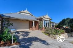 8 Eliza Heights Pakenham VIC 3810 $760,000 - $800,000 Set amongst beautifully landscaped gardens in the heart of the Cardinia Lakes Estate, this beautiful home offers an ideal blend of comfort, quality and style! Character filled offering three spacious bedrooms, including a master suite with a walk-in robe and private ensuite, high ceilings and two inviting living areas - this home is designed for both relaxation and entertaining. The open-plan kitchen, complete with Caesarstone benchtops, quality appliances, and an abundance of natural light, flows seamlessly into the living and dining areas, making it perfect for everyday living. Step outside to a covered alfresco that overlooks the manicured lawn, established gardens, and stunning views over Eastbourne Reserve. The property is energy-efficient with 16 solar panels and provides year-round comfort through ducted heating and split system air-conditioning. Located within walking distance of Cardinia Lakes Shopping Centre, schools, parklands, and public transport, and with easy access to the M1 freeway, this home offers the perfect balance of tranquillity and convenience.