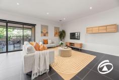 13 John Russell Rd Cranbourne West VIC 3977 $890,000 - $979,000 Showcasing immediate appeal and generous space, this contemporary home in a prized location delivers a rewarding family lifestyle and a promising future. Freshly painted throughout the generous floor plan offers spacious light-filled living zones from the intimacy of the theatre room to the light-filled open-plan living areas. Each space allows families to gather or retreat as desired. At the heart of the design is a gourmet kitchen with stone bench tops, a dedicated workspace, and a walk-in pantry. One can mingle and work at the same time. An inviting alfresco is accessed from the living room, complete with heat banks and roller shades to shield you from the elements, it offers room to entertain year-round. Encompassed by a mature garden setting. For a little extra luxury, the sauna sits privately in the yard. A great space to unwind. A total of five bedrooms provides supreme accommodation. The master suite private by design, features a deluxe ensuite with twin vanities and a walk-in robe. Each of the remaining four bedrooms is robed and serviced by a modern family bathroom. An oversized garage for two vehicles under the roofline offers additional space to tinker or room for storage. Complete with ducted heating and refrigerated cooling the former display home offers style and substance in the most convenient location.