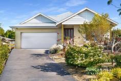 12 Barton Cl Mittagong NSW 2575 $1,395,000 Welcome to 12 Barton Close, a modern retreat at the end of a tranquil cul-de-sac. Surrounded by a beautifully landscaped front garden featuring low-maintenance plantings, the property boasts a bright, north-facing aspect that invites warm sunlight throughout the day. Inside, the home is designed for family living, with an open-plan kitchen, living, and dining area complemented by a separate media room—perfect for movie nights or quiet relaxation. The covered, private alfresco area extends your living space outdoors, making it ideal for year-round entertaining. The bonus "Artist Retreat" at the rear provides an inspiring creative haven for painting, writing, or simply finding your muse. With easy access to Mittagong Town Centre and the Sydney freeway, you can enjoy the peace of your cul-de-sac retreat while remaining close to all essential amenities. Move in, relax, and immerse yourself in the idyllic surroundings of your new home. Features include; Gas ducted central heating | Plantation shutters Laminate flooring | Woollen carpet Kitchen featuring pendant lighting, BLANCO 900mm oven, 900mm gas cooktop, Miele dishwasher and large butler’s pantry Master bedroom with walk-in robe and ensuite Large covered alfresco area NBN fibre to the house 5270L water tank