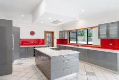 17 Boyce Avenue Austinmer NSW 2515 An oasis of modern comfort, positioned within the prized beachside community of Austinmer. This generously proportioned family home represents everything magical about coastal living:- privacy, tranquility, a leafy outlook and of course easy access to the beach. It's the perfect setting to escape from the hustle & bustle so you can start enjoying your new coastal lifestyle. YOUR HOME • This spacious 6 bedroom home offers plenty of space for the whole family. Every room is ample in size providing you room to move. • Many warm summer days are sure to be spent in the beautiful backyard, whether that be laying by pool, enjoying a bbq with friends and family on the paved entertaining area, or watching the kids play in the flat and fenced backyard. • It is said that the kitchen is the heart of a home, and that is certainly true in this instance. A large gourmet kitchen will make preparing meals, a genuine pleasure. Featuring a island bench, plenty of storage, quality appliances and an attached dining area to ensure you're never far from the action when cooking. • Offering several indoor and outdoor living areas (check floorplan) making it ideal for a large or growing family. • A highly sought after but rarely found attribute of this home is the huge lock-up triple garage. Store all of your vehicles and toys (boards, bikes etc) securely. • Adjacent to the impressive garage is the storage/rumpus room and wine cellar. With solid brick and concrete walls and plenty of privacy, this is perfect as a music room, art studio, or room to accommodate any of your other hobbies. • Stay warm through winter and cool through summer with ducted aircon throughout the home. • Although this is a safe & friendly neighbourhood, the home also has an alarm system for extra security. • Positioned on a 765m2 parcel of land with 15.2m frontage and R2 residential zoning LOCATION • This is a highly sought after location, on a quiet residential street surrounded by native flora, and only a short walk to the popular beaches, parks, shops, cafes and school. • Embrace that relaxed coastal lifestyle with swimming, fishing, surfing, hiking and sunrise/sunset walks on the beach all available only moments from your doorstep. • The local beach is patrolled and also boasts an ocean pool + great surf break. • Both the train station and bus stop are situated within walking distance. • The beautiful Glastonbury Gardens and park is situated only a moments from your front door. Perfect for those who like to spend time outdoors enjoying the sunshine. • This is one of the most desirable suburbs on this pristine coastline. It is the perfect coastal retreat approximately 1 hour South of Sydney CBD and approximately 30 minutes North of Wollongong CBD. • Austinmer offers a community-based coastal lifestyle with an easy access to Sydney and Wollongong and all that the Northern Illawarra has to offer.