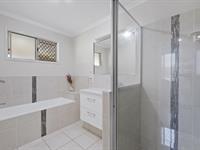 14 Caledonian Drive BEACONSFIELD QLD 4740 $500,000 Don't miss out on what is expected to be another highly sought-after home in this family-friendly location. This property will impress you from the moment you arrive. Step inside, and you'll be impressed by the expansive open-plan living area where the whole family can gather in air-conditioned comfort. The home boasts a fully air-conditioned interior, and a kitchen designed to delight, with an appealing layout that's perfect for both everyday meals and entertaining. The property features four spacious bedrooms, three of which have built-in wardrobes, including his-and-her robes in the master suite. The modern bathroom, along with the convenience of a second toilet, ensures ample space for family living. The laundry with excellent storage adds to the home's practicality. Outside, you'll find the entertaining area, perfect for year-round gatherings, along with a double carport and a garden shed for extra storage. The generously sized, fully fenced backyard offers plenty of room for kids and pets to play, making it ideal for family life.