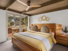 19 Beach Pde Sandy Point VIC 3959 $915,000 This meticulously presented property offers the perfect low-maintenance coastal escape. Situated on an approx. 583m² block, just 200 meters from Ned Neale's lookout and the dog-friendly beach, and 800 meters from the local coffee shop and Surf Club. Enjoy the very best of beachside living with convenience right at your doorstep. The striking architectural design showcases a blend of 'Sharpline' Colorbond and Victorian Ash shiplap cladding, beautifully complimented by low-maintenance coastal gardens. The outdoor space has been thoughtfully crafted for year-round enjoyment, including a fully enclosed Merbau deck, firepit, and a private, secure rear garden-perfect for entertaining or simply relaxing in every season. Step inside to a bright, airy interior defined by a neutral colour palette, extensive glazing, and a northern orientation that bathes the home in natural light. The open-plan living area seamlessly flows onto the outdoor entertaining space, while the kitchen boasts premium finishes such as Caesarstone countertops, Bosch appliances and earth-toned soft close cabinetry, perfectly paired with timber flooring and open shelving. Zoned reverse cycle air conditioning and electric fireplace ensure the perfect temperature inside. The master bedroom adjoins a luxuriously appointed bathroom that features a large walk-in shower, Blackbutt vanity, underfloor heating, and heated towel rail. A central skylight fills the space with natural light, creating a spa-like atmosphere. The home also includes a well-appointed laundry/utility room with built-in storage and a separate W.C. The lined and insulated garage includes a storage area that doubles as a games room or home gym, with parking space for multiple vehicles or a boat. Designed with sustainability in mind, the property features a 10kW solar system, 14kW battery storage (full house backup), solar hot water, and 3-phase power ready for future EV quick charging. Bore and tank water with a filtration system for peace of mind and water security, and a heated outdoor shower for rinsing off after the beach. Whether you're looking for a permanent coastal residence or the ultimate beachside retreat, this immaculate home offers the ideal combination of modern living, convenience, and easy maintenance.