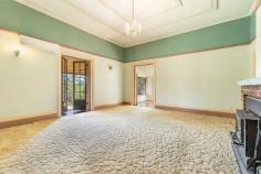 99 Lennox St Casino NSW 2470 $825,000 Originally known as the "Mitchell Residence" first time offered to the market in 80 years. This 3-bedroom home has been designed with distinction, showcases its historical significance as one of Casino's original 1880's homesteads perch high on 1162 sqm block in South Casino. Immerse yourself in its timeless elegance while enjoying modern updates. Situated on a north-facing block, residents will bask in an abundance of natural light all year round. The allure of this property lies not only in its stunning features but also in its prime location tucked away in a peaceful and idyllic lifestyle. Features wide teak floorboards under the carpets, high ornate ceilings, picture rails, french doors, wide skirting, fireplaces, air-conditioning, and solar panels. - The grand wide hallway that leads you into the heart of the house, to the magnificent formal lounge room and master bedroom with high ornate ceilings and ample natural light pouring in through French doors, these rooms are truly a sanctuary. - During colder months, curl up by the fireplace in the large formal lounge room, creating warmth and ambiance throughout this charming abode. - A large sunroom drenched in natural sunlight offers versatility and can be transformed into a cozy reading nook or a home office - As you step onto the front deck, you'll be greeted by breathtaking views overlooking the town and the tranquil Richmond River. - Imagine starting your day with a cup of coffee while soaking up the morning sun and watching the world casually pass by or afternoon breezes - Sunlit kitchen has a dishwasher, elevated stove and plenty of cupboard and bench space with adjoining meals area - Main bathroom has a deep bath, large shower and separate toilet, 2nd toilet outside off the spacious covered entertaining area - With practicality in mind, this property provides ample parking space with a double lock-up garage and an additional 2 bay shed being a workshop and caravan storage.