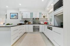 8 Catherine Close BENTLEY PARK QLD 4869 $659,000 Welcome to this impressive 836m² block, perfectly positioned in a quiet cul-de-sac with its own large council-maintained park directly opposite. This well-designed home combines modern living with practical features, making it an ideal choice for families seeking both comfort and convenience. KEY FEATURES- • Expansive Outdoor Space: Enjoy stunning front and rear landscaping, with room for an 11m lap pool or splash pool. The large covered patio is perfect for outdoor entertaining, complete with multiple fans and excellent lighting. • Versatile Layout: This property offers 4 bedrooms or 3 bedrooms plus a standalone office. The office is fitted with multiple desks, shelves, and has good lighting and air-conditioning-ideal for remote work or study. • Comfort and Style: The home boasts a large kitchen and dining area, a huge TV lounge room with Foxtel, and a large fully shelved storage cabinet. The master bedroom features an ensuite, a king-size bed, and a spacious 3-bay shelved wardrobe. • Modern Upgrades: Enjoy the benefits of LED lighting throughout the house, air-conditioning in the lounge and all bedrooms, ceiling fans throughout, and modern interior paintwork and carpets replaced just 4 years ago. • Functional Garaging: The oversized 6m x 7m garage with a remote electric double door provides ample space for vehicles and storage. Additionally, a large 3-bay shed with power points, fans, and lighting offers plenty of extra storage and workspace. • Recent Improvements: The property includes recently replaced fences (both colorbond and rear timber), excellent drainage, and updated water mains with high water pressure. • Prime Location: Centrally located to all amenities, including South's Football Club, Mount Sheridan Shopping Centre, Woolworths & Coles, Piccone's IGA, Edmonton Library, and cafes. Just a 15-minute drive to Cairns CBD, and surrounded by parks with walkways and bike tracks. This home is a rare find with its blend of modern amenities, functional spaces, and a fantastic location. Don't miss the chance to make this your new family retreat!