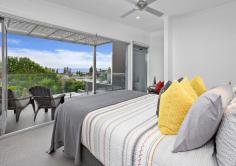 4A Gura Street Kiama NSW 2533 For those who cherish the vibrant energy of Kiama yet seek something more than apartment living, this luxurious townhouse with harbour and ocean views offers the perfect escape. Nestled in the highly coveted Pheasant Point precinct, this rare opportunity marries coastal elegance with the convenience of Kiama's township life. This residence is more than a home - it's an invitation to indulge in an elevated lock-up-and-leave lifestyle. Wake up to breathtaking views of Kiama's harbour and township, with the heart of town just a short, leisurely stroll away. But once you step inside, the world feels relaxed and calmer. Dual street access on quiet streets ensures privacy and ease of access, while the landscaped gardens provide a peaceful outdoor sanctuary. Inside, sophistication meets thoughtful design at every turn. Freshly designed interiors, adorned with a crisp white palette and contemporary polished concrete flooring, create a serene ambience in the living and dining areas. Imagine hosting intimate gatherings or enjoying quiet evenings in spaces that flow effortlessly from front to rear. Expansive floor-to-ceiling glass doors flood the home with natural light and invite the outdoors in, blurring the boundaries between outside nature and inside living. The potential for a plunge pool adds another layer of luxury, making this townhouse the ultimate retreat. The master suite upstairs is your private haven. Step onto a balcony, where stunning ocean and harbour views await, providing the ideal backdrop for sipping your morning coffee, reading, or simply basking in Kiama's sunlight and ocean breeze. Whether you're a professional seeking a designer lifestyle with minimal maintenance or a retiree looking for a luxurious coastal sanctuary, this home offers the perfect balance of comfort and sophistication. Don't miss your chance to secure this exceptional property and immerse yourself in the beauty and tranquility of Kiama's most sought-after locale.