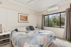 13 Ryan Street Talbingo NSW 2720 Positioned on the high side of the treelined street of Ryan, sits this well maintained high-set three-bedroom home. Boasting three great sized bedrooms, formal living, well maintained kitchen, ample heating and cooling options and a 6m x 10m colourbond shed with awning for additional covered parking or the perfect rear entertainment area. You will love the livability of this extremely well maintained three-bedroom home, in the heart of Talbingo. Do not miss your opportunity, call today to book your inspection! Premiere Features: - Three great sized bedrooms, with two offering ceiling fans and split system air conditioning - Centrally located and well-maintained bathroom with shower, single vanity and toilet - Kitchen with electric cooktop, ample storage options and bench space - Large formal living room upon entry with wood box fire, split system air conditioning and ceiling fan - Internal laundry with new flooring positioned to the rear of the plan - Mudroom with external access adjacent the laundry - Second separate toilet - Quaint covered timber entry - Gas hot water - Fully fenced and low maintenance yard - 6m x 10m colourbond shedding with additional awning running the length of the shed, perfect for additional covered parking or fully covered outdoor entertaining area - Garden shed - Additional wood shed - External power to the front of the home - Approximate 710m² allotment Do not miss your opportunity to secure this low maintenance and well maintained three-bedroom family home with all the modern creature comforts.