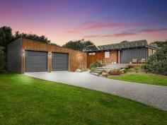 19 Beach Pde Sandy Point VIC 3959 $915,000 This meticulously presented property offers the perfect low-maintenance coastal escape. Situated on an approx. 583m² block, just 200 meters from Ned Neale's lookout and the dog-friendly beach, and 800 meters from the local coffee shop and Surf Club. Enjoy the very best of beachside living with convenience right at your doorstep. The striking architectural design showcases a blend of 'Sharpline' Colorbond and Victorian Ash shiplap cladding, beautifully complimented by low-maintenance coastal gardens. The outdoor space has been thoughtfully crafted for year-round enjoyment, including a fully enclosed Merbau deck, firepit, and a private, secure rear garden-perfect for entertaining or simply relaxing in every season. Step inside to a bright, airy interior defined by a neutral colour palette, extensive glazing, and a northern orientation that bathes the home in natural light. The open-plan living area seamlessly flows onto the outdoor entertaining space, while the kitchen boasts premium finishes such as Caesarstone countertops, Bosch appliances and earth-toned soft close cabinetry, perfectly paired with timber flooring and open shelving. Zoned reverse cycle air conditioning and electric fireplace ensure the perfect temperature inside. The master bedroom adjoins a luxuriously appointed bathroom that features a large walk-in shower, Blackbutt vanity, underfloor heating, and heated towel rail. A central skylight fills the space with natural light, creating a spa-like atmosphere. The home also includes a well-appointed laundry/utility room with built-in storage and a separate W.C. The lined and insulated garage includes a storage area that doubles as a games room or home gym, with parking space for multiple vehicles or a boat. Designed with sustainability in mind, the property features a 10kW solar system, 14kW battery storage (full house backup), solar hot water, and 3-phase power ready for future EV quick charging. Bore and tank water with a filtration system for peace of mind and water security, and a heated outdoor shower for rinsing off after the beach. Whether you're looking for a permanent coastal residence or the ultimate beachside retreat, this immaculate home offers the ideal combination of modern living, convenience, and easy maintenance.