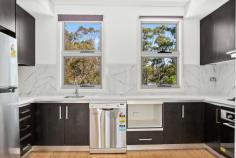 6/483 Crown Street Wollongong NSW 2500 $600,000 Generously proportioned yet low in maintenance, this two-bedroom townhouse offers all the space you crave on a manageable scale. From the moment you approach its striking facade, you'll be captivated by its perfect blend of style and functionality. Spanning two levels, this residence offers a generous sense of space, with sleek bamboo flooring throughout and thoughtfully crafted details in every corner. Both bedrooms feature built-in robes, while the modern gas-equipped kitchen boasts stunning stone bench tops and ample storage. A convenient study nook adds versatility, ideal for students or WFH professionals, while the sun-kissed balcony provides plenty of space for alfresco entertaining and a tranquil potted garden. two-bedrooms with BIRs, double-garage modern kitchen wiht stone bench tops a study nook for students, WFH professionals bamboo flooring, two levels, euro laundry sun-kissed balcony perfect for entertaining