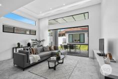 135 Croydon Road Hurstville NSW 2220 $1,900,000 Contemporary family living finds a new address in this highly convenient Hurstville pocket. This exclusive architect-designed residence delivers a luxurious modern approach to easily managed living and entertaining, while serving up space and style like few others in the area. Set on the high side of the street and catching a view of the city, it's the perfect ready-made retreat for a large and growing family, and a very accessible setting adds the final touch, as it's conveniently located footsteps to the bus stop, neighbourhood parks and all the area's quality schools, with Hurstville's CBD a few minutes away. *Complete double brick construction with solid concrete slabs *Sleek and contemporary interiors feature an expansive open plan layout *Four upper-level bedrooms are all fitted with generous custom built-ins *The king-sized master features a designer ensuite and walk-in wardrobe *Downstairs study or guest/fifth bedroom with built-in and adjoining bathroom *Deluxe island kitchen with high-end Euro fittings and stone benchtops *Level flow to a dining patio with full outdoor kitchen plus a grassed garden *A separate studio/work-from-home space or kids' retreat at the rear *Automatic garage with storage space & internal access plus driveway parking *Ducted air-conditioning, app-controlled security system & smart entry access *Solid natural timber flooring, expansive natural stone works and high ceilings *Quality commercial aluminium bifold doors, stacker doors and windows *Quick and convenient access to Westfield Hurstville, schools and amenities *Walking distance to Sydney Tech High, Danebank Private and Hurstville Public