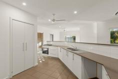 21 Fairway Drive Cable Beach WA 6726 $949,000 Spacious and stylish family living in a premium beachside location? What more could you want!? Spread over a large corner block in the highly sought-after Sunset Rise Estate, the 4 bed, 2 bath home has been carefully crafted delivering flexible, feature-packed spaces both inside and out. Boasting a meticulously thought-out floorplan, every inch of the home has been expertly considered to deliver an entertainer's dream mixed with the perfect amount of peace and privacy. From the front, the home boasts great street appeal thanks to reticulated, manicured gardens with lush green grass and towering mature palms. The large double carport with feature timber slits offers plenty of secure parking with the raised, decked entry with feature bush poles providing to perfect welcome. Inside is sublime with no expense spared to create vibrant, modern living with a sophisticated sense of style. Spacious, tiled open plan living and dining with abundant natural light thanks to louvre windows and huge glass sliding doors. The centrepiece of the home is the gorgeous modern kitchen with expansive benchtops, tiled splashback, stainless steel oven and cooktop, built-in pantry and huge breakfast bar. Key features of this phenomenal home include the separate tiled games/activity room or second living area to the front, large main bathroom with separate shower and bath, separate laundry with built-in linen cupboard and overhead and underbench cupboards, air-conditioning, ceiling fans, modern downlights, window blinds, security screens and more. The home itself boasts 4 big and bright bedrooms, both with built-in robes and air-con, including the spacious Master suite complete with huge dual walk-in robes, private ensuite and access to the rear deck. Designed the bring the outdoors in, big glass sliding doors from the living/dining areas open fully onto the expansive, decked undercover entertaining area with views out over the gorgeous, manicured rear garden. There's plenty of lush green grass for the kids and pets to play and a roller door storage shed for added storage options. Set in a secure and stylish estate close to a park and just a few minutes' walk from the cafes, bars and restaurants of Cable Beach, you'll be hard pressed to find a better home in a better Broome location.