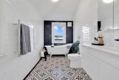 128 Caledonia St Kearsley NSW 2325 $680,000 - $720,000 – A stunning light filled modern renovation steeped with history! – Three bedrooms plus study, or fourth bedroom. The study has access to the verandah and could be a perfect office. – Lounge room features an original fireplace, double hung windows and French doors opening to the verandah. – Open plan kitchen and dining, very functional kitchen with stone benchtop. – Quality as new bathroom is a must see, heritage look and feel with a clawfoot bath being a showpiece. – Second toilet in laundry. – The 30m2 hardwood sheltered deck is a great addition to the home overlooking all the beautiful level yardspace and garage. – The garage is positioned perfectly, three bay internal and a bay for the van, boat or machinery. – Potential land size and access for a second dwelling, being a corner site stca – Fully fenced secure property – All round winner in the popular Kearsley Village, walk to school, sporting fields and tennis courts