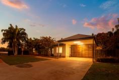 21 Fairway Drive Cable Beach WA 6726 $949,000 Spacious and stylish family living in a premium beachside location? What more could you want!? Spread over a large corner block in the highly sought-after Sunset Rise Estate, the 4 bed, 2 bath home has been carefully crafted delivering flexible, feature-packed spaces both inside and out. Boasting a meticulously thought-out floorplan, every inch of the home has been expertly considered to deliver an entertainer's dream mixed with the perfect amount of peace and privacy. From the front, the home boasts great street appeal thanks to reticulated, manicured gardens with lush green grass and towering mature palms. The large double carport with feature timber slits offers plenty of secure parking with the raised, decked entry with feature bush poles providing to perfect welcome. Inside is sublime with no expense spared to create vibrant, modern living with a sophisticated sense of style. Spacious, tiled open plan living and dining with abundant natural light thanks to louvre windows and huge glass sliding doors. The centrepiece of the home is the gorgeous modern kitchen with expansive benchtops, tiled splashback, stainless steel oven and cooktop, built-in pantry and huge breakfast bar. Key features of this phenomenal home include the separate tiled games/activity room or second living area to the front, large main bathroom with separate shower and bath, separate laundry with built-in linen cupboard and overhead and underbench cupboards, air-conditioning, ceiling fans, modern downlights, window blinds, security screens and more. The home itself boasts 4 big and bright bedrooms, both with built-in robes and air-con, including the spacious Master suite complete with huge dual walk-in robes, private ensuite and access to the rear deck. Designed the bring the outdoors in, big glass sliding doors from the living/dining areas open fully onto the expansive, decked undercover entertaining area with views out over the gorgeous, manicured rear garden. There's plenty of lush green grass for the kids and pets to play and a roller door storage shed for added storage options. Set in a secure and stylish estate close to a park and just a few minutes' walk from the cafes, bars and restaurants of Cable Beach, you'll be hard pressed to find a better home in a better Broome location.