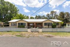 1-2/7 Macquarie Street Tumut NSW 2720 $650,000 Positioned in a quiet one-way street and in close proximity to town, sits this high yielding duplex home. Comprising of three bedrooms each, large living areas and formal kitchens over looking the rear yard, you will love the versatility and opportunity on offer in 7 Macquarie Street Tumut. With both properties currently tenanted and grossing $820 per week ($410 each) and positioned on a large medium density private allotment, with no body corporate fees. 7 Macquarie is an opportunity not to be missed. Call today to book your inspection. Premiere Features: - Three great sized bedrooms in each unit, master boasting built in robes - Privately positioned bathrooms with shower over bath, single vanity and toilet in one and shower, single vanity and toilet in the second unit - Good sized kitchens with electric cooktops, ample cabinetry and bench space, all overlooking the rear yard - Large living areas serviced by reverse cycle split system air conditioners - Internal laundries off the kitchen with direct access to the rear yard - Quaint fully covered front verandahs - Fully fenced and separated front yards - Large private allotment with vehicle access to the rear yard - Approximate 1,233m² allotment - Unit one currently tenanted at $410 per week (expires 27th March 2025) - Unit two currently tenanted at $410 per week (expires 12th April 2025) - No body corporate fees applicable (two units on one title)