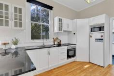 128 Caledonia St Kearsley NSW 2325 $680,000 - $720,000 – A stunning light filled modern renovation steeped with history! – Three bedrooms plus study, or fourth bedroom. The study has access to the verandah and could be a perfect office. – Lounge room features an original fireplace, double hung windows and French doors opening to the verandah. – Open plan kitchen and dining, very functional kitchen with stone benchtop. – Quality as new bathroom is a must see, heritage look and feel with a clawfoot bath being a showpiece. – Second toilet in laundry. – The 30m2 hardwood sheltered deck is a great addition to the home overlooking all the beautiful level yardspace and garage. – The garage is positioned perfectly, three bay internal and a bay for the van, boat or machinery. – Potential land size and access for a second dwelling, being a corner site stca – Fully fenced secure property – All round winner in the popular Kearsley Village, walk to school, sporting fields and tennis courts