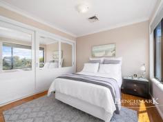 81 Freya St Kareela NSW 2232 Nestled in a peaceful, family-friendly suburb, this north-facing residence combines generous space, plenty of light throughout and breathtaking water views in an idyllic setting. Elevated on the high side of the street, this home captures sweeping vistas of the bay from every level, creating an exceptional lifestyle sanctuary for families. Features - 3 light filled Bedrooms: The main suite offers a private retreat with a luxurious ensuite and walk-in robe. - Flexible 4th Bedroom / Office: Adaptable for work-from-home needs or as a guest room. - Expansive Living Spaces: Soaring pitched raked ceilings and generous windows invite sunlight and capture scenic views. - Open-Plan Layout: Perfect for everyday living and entertaining, combining modern style with functional design. - Spacious Balcony: Entertain guests or relax with family, overlooking uninterrupted water views. - Private Leafy Yard: Adjacent to a tranquil reserve, this lush outdoor area offers peace and privacy. - Inground Pool: Your own oasis, ideal for relaxation or gatherings in a resort-like setting. - 3-Car Lockup Garage: Equipped with a convenient car lift and extra driveway space for two additional cars. - Proximity to Amenities: Enjoy a family-friendly neighborhood close to schools, parks, and shopping centers. This residence offers an extraordinary lifestyle, combining tranquility, modern living, and space for families looking to grow or simply savor the best of suburban serenity.