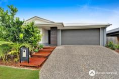 33 Neumann Drive Yarrabilba QLD 4207 $659,000 This home’s kitchen is thoughtfully designed with a 900mm gas cooktop and oven, offering a reliable and high-performing setup for culinary enthusiasts or those who simply enjoy cooking. A stone benchtop provides ample workspace for meal preparation, with additional room for appliances or decor. Numerous cabinets and a generous pantry cabinet ensure easy storage of ingredients, cookware, and kitchen essentials, helping to maintain an organized, clutter-free environment. Positioned to overlook the open plan living and dining area, this layout allows those in the kitchen to stay connected with family or guests, and an air conditioner in this space keeps it comfortable year-round. A separate living room with air conditioning near the entrance creates a distinct space apart from the main open living area. This layout is ideal for those seeking a cozy retreat for quiet relaxation or even a formal sitting area to welcome guests. This room can also serve as a versatile family lounge, media room, or dedicated playroom, adapting easily to various needs without interfering with the activities in the main living area. Each bedroom is fitted with ceiling fans, ensuring comfort during warmer months. The master bedroom, designed as a private retreat, feature s ceiling fan, a walk-in robe for abundant storage, and an ensuite bathroom for added privacy and convenience. The additional bedrooms all have built-in robes, providing organized closet space and. Centrally located, the main bathroom is strategically positioned to serve the other bedrooms and the main living areas efficiently. It includes a shower, bathtub, and a separate toilet, which helps streamline morning routines and enhances functionality for shared use. A well-equipped laundry inside the home provides easy access to the outdoors and includes a large storage cabinet, ideal for household supplies, linens, and cleaning essentials. The laundry’s positioning near outdoor access simplifies tasks like line drying or keeping mudrooms clean after gardening. The alfresco area, covered and complete with downlights and a ceiling fan, serves as a fantastic outdoor entertaining area. Overlooking the fully fenced yard, this space is perfect for hosting gatherings, enjoying outdoor meals, or simply relaxing in a shaded spot while keeping an eye on children or pets playing in the yard. With a double remote-control garage, convenient and secure parking is assured, along with space for additional storage if needed. Key Features: •Built in 2018, this home combines modern design with functional layouts, providing both style and practicality for contemporary living. •The property is equipped with a 6.5 kW solar system, providing an efficient and eco-friendly energy solution to significantly reduce electricity costs. •The kitchen is equipped with a high-quality 900mm gas cooktop and oven, perfect for avid cooks and family meal preparation. A durable stone benchtop adds elegance and offers ample workspace, while abundant cabinetry and a spacious pantry provide plenty of storage to keep the kitchen organized and clutter-free. •Open plan living and dining areas create a central hub for family activities and entertaining. Positioned adjacent to the kitchen, this area allows seamless interaction between spaces. An air conditioner ensures comfort, making it a cozy spot for gatherings or quiet relaxation. •A separate living area located at the front of the home with air conditioning provides a comfortable and versatile space away from the main living areas. Ideal for a formal lounge, home office, or media room, this space offers privacy and a quiet atmosphere, adaptable to suit varying lifestyle needs. •The master bedroom is a private retreat, featuring an ensuite bathroom for convenience, a walk-in robe for ample storage, a ceiling fan further enhances ventilation, making this room comfortable and inviting. •The remaining bedrooms are designed with comfort in mind, each featuring a ceiling fan and built-in robes. These rooms offer organized storage and pleasant airflow, creating cozy, restful spaces for family members or guests. •Positioned for easy access to all bedrooms and main areas, the main bathroom is functional and family-friendly, featuring a shower, a relaxing bathtub, and a separate toilet for added convenience during busy routines. •The laundry is located within the home and includes a spacious storage cabinet, making it easy to manage household tasks. With direct access to the outdoors, it simplifies tasks such as hanging out laundry or quickly stepping in after outdoor activities. •An undercover alfresco area, complete with downlights and a ceiling fan, offers an inviting outdoor space for dining, relaxation, or entertaining. Overlooking the fully fenced yard, this area is perfect for enjoying the outdoors in a shaded, comfortable setting. •The double remote-control garage provides secure parking for vehicles and additional storage space, ensuring practicality and peace of mind.