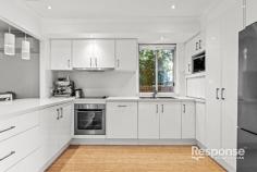 1/2 Canyon Rd Baulkham Hills NSW 2153 Nestled in a quiet, boutique complex in Baulkham Hills, this light-filled townhouse offers a blend of modern comfort and low-maintenance lifestyle. Immaculately presented and updated throughout, it's a move-in-ready home designed for easy living and entertaining. Step into open living spaces finished with stylish timber floors, complemented by a modern Caesarstone kitchen adjoining a spacious dining area. The indoor-outdoor flow is seamless, thanks to large stacker doors opening to an expansive alfresco deck in spotted gum - perfect for year-round relaxation or entertaining. This home features three generous bedrooms, a renovated laundry with a separate toilet, and two private courtyards with rare side access for added privacy and convenience. With an abundance of storage throughout, you'll have everything you need at your fingertips. Positioned in a peaceful cul-de-sac just 1km from Baulkham Hills CBD and The Gove Square Mall, and with M2 express city transport and quality schools nearby, this townhouse provides all the lifestyle benefits in a prime location.