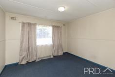 1-2/7 Macquarie Street Tumut NSW 2720 $650,000 Positioned in a quiet one-way street and in close proximity to town, sits this high yielding duplex home. Comprising of three bedrooms each, large living areas and formal kitchens over looking the rear yard, you will love the versatility and opportunity on offer in 7 Macquarie Street Tumut. With both properties currently tenanted and grossing $820 per week ($410 each) and positioned on a large medium density private allotment, with no body corporate fees. 7 Macquarie is an opportunity not to be missed. Call today to book your inspection. Premiere Features: - Three great sized bedrooms in each unit, master boasting built in robes - Privately positioned bathrooms with shower over bath, single vanity and toilet in one and shower, single vanity and toilet in the second unit - Good sized kitchens with electric cooktops, ample cabinetry and bench space, all overlooking the rear yard - Large living areas serviced by reverse cycle split system air conditioners - Internal laundries off the kitchen with direct access to the rear yard - Quaint fully covered front verandahs - Fully fenced and separated front yards - Large private allotment with vehicle access to the rear yard - Approximate 1,233m² allotment - Unit one currently tenanted at $410 per week (expires 27th March 2025) - Unit two currently tenanted at $410 per week (expires 12th April 2025) - No body corporate fees applicable (two units on one title)