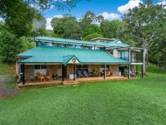 356 Corndale Rd Corndale NSW 2480 $1,325,000 At the end of the tree lined driveway - serenity awaits! A combination of brick, steel, timber and slate constructed over three levels. Ground level includes open plan living with high ceilings filled with natural light, timber floor boards, central combustion heater separating kitchen and dining area, pantry and ample storage in kitchen. Three spacious bedrooms, separate bath with hidden shower and separate toilet. Upstairs features large private master with ensuite and private balcony taking in magnificent rural outlook and night lights of Lismore as the backdrop. Also features an additional private turret style deck with views over a bushland setting and home to a wide range of birdlife. Other benefits include town water, garage space, separate laundry area with 3rd bathroom, set on 5 secluded acres just minutes to Bexhill village, 15 km to Lismore, 35km to Byron Bay and Ballina airport and beaches.