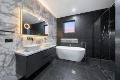 20 Niland Street WHITLAM ACT 2611 $1,650,000 Set against the backdrop of picturesque hills, greenery, and a serene lake, this stunning property offers breathtaking views from multiple vantage points, including the main bedroom and top living areas. Step outside to the covered alfresco area, complete with an outdoor kitchen, ideal for hosting memorable gatherings. Whether it is a quiet family evening or a lively barbecue, you will enjoy the perfect balance of comfort and nature. With its low-maintenance backyard, there is room for outdoor activities or simply unwinding in tranquillity. Inside, the home boasts multiple living spaces, including an upper level designed to maximise the stunning scenery. The kitchen will truly inspire your culinary potentials, featuring high-end Smeg and Bosch appliances, an expansive stone island bench with storage on both sides, and a massive pantry that ensures effortless organisation. You will never run out of storage space in this well-designed home. The generous laundry room and unique ceiling designs in every bedroom add to the home's appeal, blending functionality with artistic charm. And for nature lovers, kangaroos and Australian wildlife make frequent appearances at your doorstep and on the Pinnacle Nature Reserve, bringing a touch of wilderness. FEATURES: Termite free true core steel frames R5.0 insulation throughout the ceiling R2.5 external walls R2.0 internal walls 13.5kw solar system Double glazed windows Panel lifted customised special garage door Special epoxy garage floor Feature walls with customised designs on ceilings Special effect feature walls in all bedrooms Quality ceiling fans with remotes Quality fabric curtains in addition to blinds Customised features bulkhead and walkway Feature lights throughout the house Black hanger switches LED lights in bedrooms, kitchen and living area 100mm Kitchen island bench stone with waterfalls 40mm bench stone kitchen, pantry and all venaties 900mm smeg glass cooktop 600mm smeg oven 6 series Bosh dishwasher High range Bosh microwave Customised glass cabinets in kitchen Undermount sink Pull out sink mixer Double storage under island bench 2-way doorbells Outdoor covered customised kitchen in alfresco with extra storage Customised bulkhead over island bench 16/18 ducted Daikin heating and cooling with smartphone operation Customised double vanities with 40mm bench stone and Croma wall mixers Free-standing bathtub in ensuite and main bathroom Free-standing spout Croma shower mixers and with ceiling showers and diverters Customised doors with special gloss spray paint Lane door handles Touch screen LED bathroom mirrors with zoom glasses Customised pivot entry door with self close and smart lock Semi-frameless shower screens Italian feature tiles in bathroom Bathroom recess with LED lights Low maintenance backyard Swan security cameras Special spider man effects feature in kids room Customised inbuilt walking robes Prime platinum laminate Timber floor Living areas 600 x 1200 custom tiles PROXIMITY: Evenly Scott School Charles Weston School Blue Poles Park - Whitlam Central Community Playground Ridgeline Park Cravens Crossing Park Ruth Park Heatbeat Café Denman Village Shops Koko Molonglo Centre Stromlo Forrest Park Stromlo Leisure Centre Jamison Centre Cooleman Court STATISTICS (all measures/figures are approximate): Built: 2022 Block 4 Section 28 Land size: 466.00 sqm Home size: 284.13 sqm Upper Level: 83.01 sqm Lower Level: 165.12 sqm Garage: 36.00 sqm Rental appraisal: $1,150.00 - $1,250.00 per week EER: 6.0