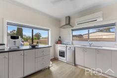 69 Blowering Road Tumut NSW 2720 $529,000 Privately positioned on the very edge of town and set upon a generous allotment, sits this three-bedroom, two-bathroom solid block home with great shedding and ample space for the kids to play. Just a short drive to the Tumut retail centre and walking distance to local schools and community facilities, this three-bedroom, two-bathroom family home is sure to not last long. Call today to book your inspection! Premiere Features: - Three great size bedrooms with ensuite privately positioned off the master bedroom - Main bathroom offering combined shower over bath and single vanity - Ensuite with floor to ceiling tiling boasting shower, toilet and single vanity - Open plan living and dining area, flowing directly to the kitchen and all serviced by reverse cycle split system air conditioning, wood box fire heater and ceiling fan - Sun filtered kitchen with gas cooktop, stainless range hood and dishwasher, ample cabinetry and mobile "butchers block" style island bench with built in cabinetry and ceiling fan - Additional rumpus area or sunroom positioned to the back of the plan, with direct external access - Internal laundry positioned off the sunroom and boasting a second toilet - Rear fully covered paved entertaining area overlooking the rear yard - Large fully fenced and private rear yard with ample garden shedding - Double bay colourbond shedding with additional double carport fenced off in the rear yard with light and power options - Large low maintenance front yard - Solar power connected - Generous approximate 1,490m² allotment with the home positioned privately toward the rear and in close proximity to all major services and amenities - Property is currently tenanted until 14th March 2025 Do not miss your opportunity to secure this three-bedroom family home, privately positioned on the very edge of town.