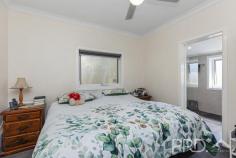 69 Blowering Road Tumut NSW 2720 $529,000 Privately positioned on the very edge of town and set upon a generous allotment, sits this three-bedroom, two-bathroom solid block home with great shedding and ample space for the kids to play. Just a short drive to the Tumut retail centre and walking distance to local schools and community facilities, this three-bedroom, two-bathroom family home is sure to not last long. Call today to book your inspection! Premiere Features: - Three great size bedrooms with ensuite privately positioned off the master bedroom - Main bathroom offering combined shower over bath and single vanity - Ensuite with floor to ceiling tiling boasting shower, toilet and single vanity - Open plan living and dining area, flowing directly to the kitchen and all serviced by reverse cycle split system air conditioning, wood box fire heater and ceiling fan - Sun filtered kitchen with gas cooktop, stainless range hood and dishwasher, ample cabinetry and mobile "butchers block" style island bench with built in cabinetry and ceiling fan - Additional rumpus area or sunroom positioned to the back of the plan, with direct external access - Internal laundry positioned off the sunroom and boasting a second toilet - Rear fully covered paved entertaining area overlooking the rear yard - Large fully fenced and private rear yard with ample garden shedding - Double bay colourbond shedding with additional double carport fenced off in the rear yard with light and power options - Large low maintenance front yard - Solar power connected - Generous approximate 1,490m² allotment with the home positioned privately toward the rear and in close proximity to all major services and amenities - Property is currently tenanted until 14th March 2025 Do not miss your opportunity to secure this three-bedroom family home, privately positioned on the very edge of town.
