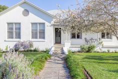 42 Bolwarra Road Bolwarra NSW 2320 $1,080,000 - $1,150,000 This superbly maintained, excellently positioned and much-loved family home is available to the market for the first time. Master built 30 years ago, located in the heritage village of Bolwarra, this immaculate residence is a unique and exciting offering to the market. Entering the home, you will be greeted by high ceilings and beautiful hardwood floorboards. Off to the left you have a formal living and dining room with wonderful north-east facing windows, drenching the room in natural light. Proceeding through, you will arrive at the well laid out family living, dining and kitchen with expansive views to the south-west. The kitchen is large and practical, complete with gas cooktop, electric oven and an abundance of cabinetry. You are drawn out to the magnificent indoor/outdoor area, terrific for taking in the evening sunsets and entertaining family and friends. The whole home has an excellent feel, it really is a property that picks you up and hugs you. You will find three bedrooms upstairs, all with built in robes and ceiling fans, and one bathroom upstairs complete with separate toilet and vanity. Heading downstairs the property has an extra bedroom space, extra living room or just general utilities room, it is such a versatile space, there are multiple potential uses. Downstairs you will also find the second bathroom and laundry, spacious double garage, as well as access under the home. Heading outside you will enter the jewel in the crown of this superb home. With one of the most beautiful and well thought out cottage gardens, the charming feel of Trill Cottage continues. With lovely beds of daisies and roses, as well as mature liquid amber and crepe myrtle trees, the garden compliments the home and ads to its lovely feel. 42 Bolwarra Road sits at unique point in the market. Often sought but rarely found, a master built home only 30 years old does not require the ongoing maintenance of an older, heritage property, however this home had been designed to blend in perfectly with its surroundings and look like it has been there forever.