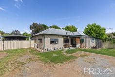 69 Blowering Road Tumut NSW 2720 $529,000 Privately positioned on the very edge of town and set upon a generous allotment, sits this three-bedroom, two-bathroom solid block home with great shedding and ample space for the kids to play. Just a short drive to the Tumut retail centre and walking distance to local schools and community facilities, this three-bedroom, two-bathroom family home is sure to not last long. Call today to book your inspection! Premiere Features: - Three great size bedrooms with ensuite privately positioned off the master bedroom - Main bathroom offering combined shower over bath and single vanity - Ensuite with floor to ceiling tiling boasting shower, toilet and single vanity - Open plan living and dining area, flowing directly to the kitchen and all serviced by reverse cycle split system air conditioning, wood box fire heater and ceiling fan - Sun filtered kitchen with gas cooktop, stainless range hood and dishwasher, ample cabinetry and mobile "butchers block" style island bench with built in cabinetry and ceiling fan - Additional rumpus area or sunroom positioned to the back of the plan, with direct external access - Internal laundry positioned off the sunroom and boasting a second toilet - Rear fully covered paved entertaining area overlooking the rear yard - Large fully fenced and private rear yard with ample garden shedding - Double bay colourbond shedding with additional double carport fenced off in the rear yard with light and power options - Large low maintenance front yard - Solar power connected - Generous approximate 1,490m² allotment with the home positioned privately toward the rear and in close proximity to all major services and amenities - Property is currently tenanted until 14th March 2025 Do not miss your opportunity to secure this three-bedroom family home, privately positioned on the very edge of town.