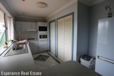 3/16 Randell Street Esperance WA 6450 $470,000 This delightful 3 bedroom, 1 bathroom unit is perfect for first-time buyers, retirees or anyone seeking a serene coastal lifestyle nestled within the town limits – only 400m to Shopping Centre and 450m to Esperance Hospital. This property offers an exceptional opportunity to own a piece of paradise in one of Western Australia’s most beautiful localities. Open plan living on entry with galley style kitchen offering wall oven, gas hob and double door pantry. Three well-appointed bedrooms including robes. This home features timber plank flooring to high traffic areas, tiled kitchen, bathroom and laundry and carpeted bedrooms. Bathroom enjoys two way access. Enjoy the outdoors on your 229 sqm block, which offers a paved yard for easy maintenance. The property also features a single carport, providing secure parking.